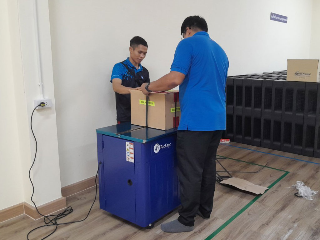 เครื่องรัดกล่อง รุ่น WE-802H ระบบ 2 มอเตอร์